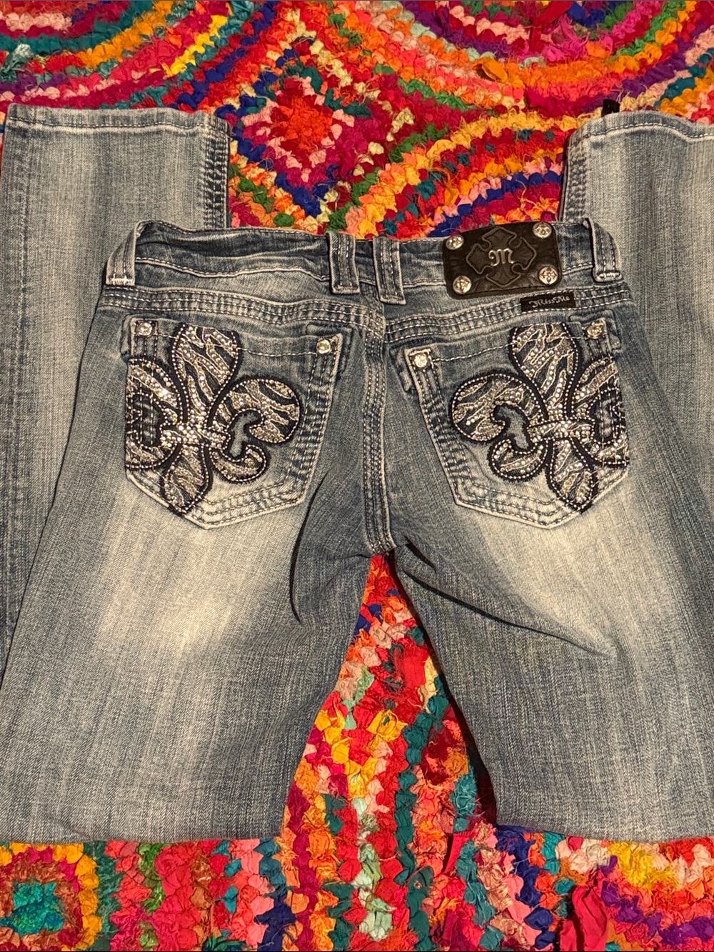 Miss Me Light Blue Boot Cut Jeans with Embellished Fleur-de-Lis Pockets